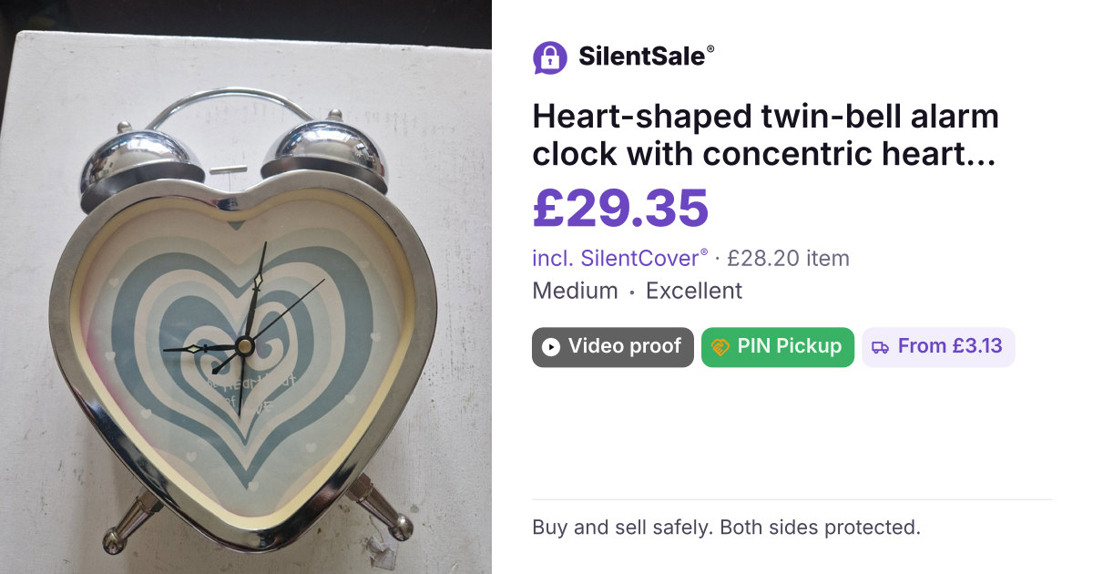 Heart-shaped twin-bell alarm clock with concentric heart design